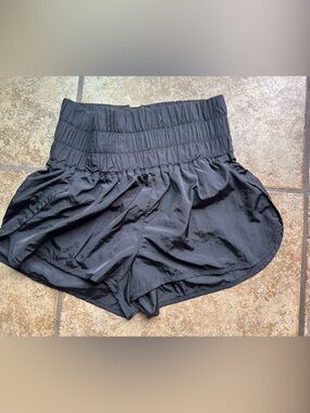 FP Movement by Free People High Smocked Waist Athletic Shorts in Black